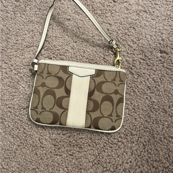 Coach Accessories - Coach Tan and Cream Signature Clutch